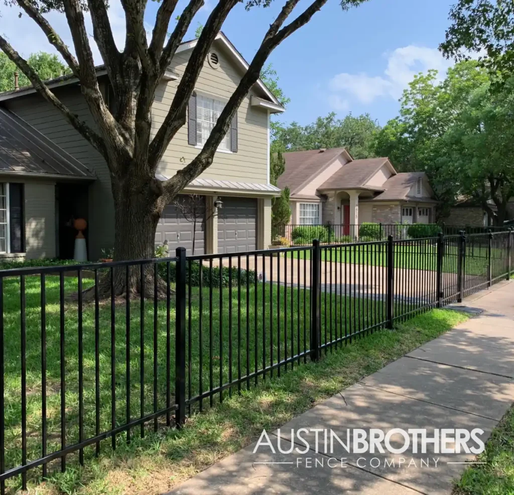 Vertical iron fence in front of an Austin, Texas home.